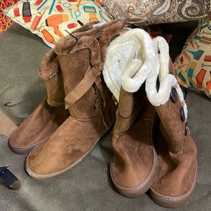 Brown up to  calf boots